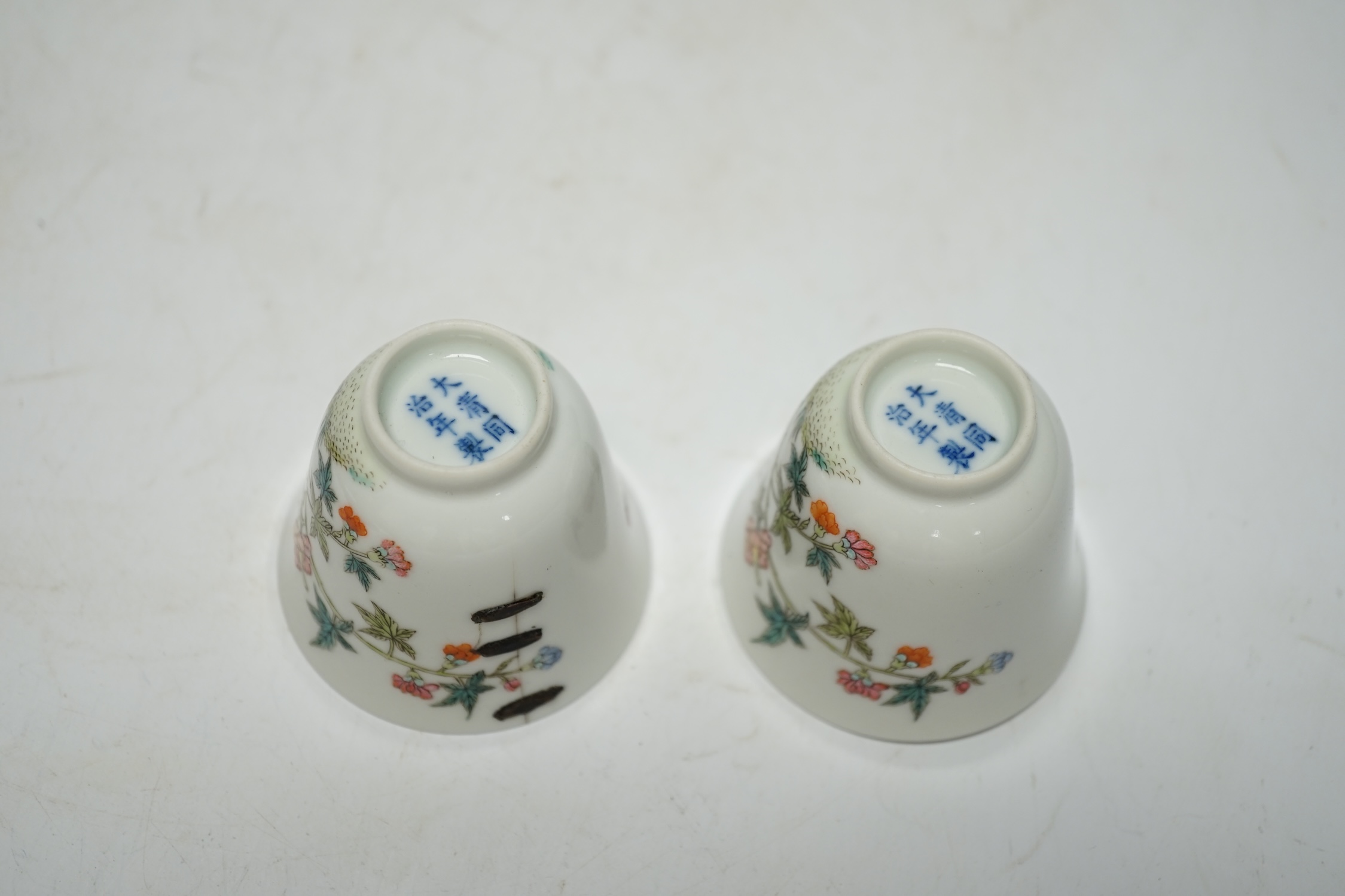 A pair of Chinese porcelain wine cups, 5.3cm high
